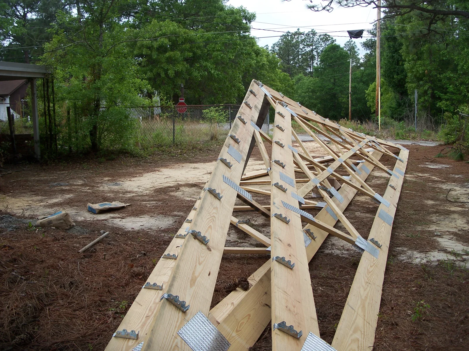 Roof trusses staged and ready to hang on a Hoover Building Systems project