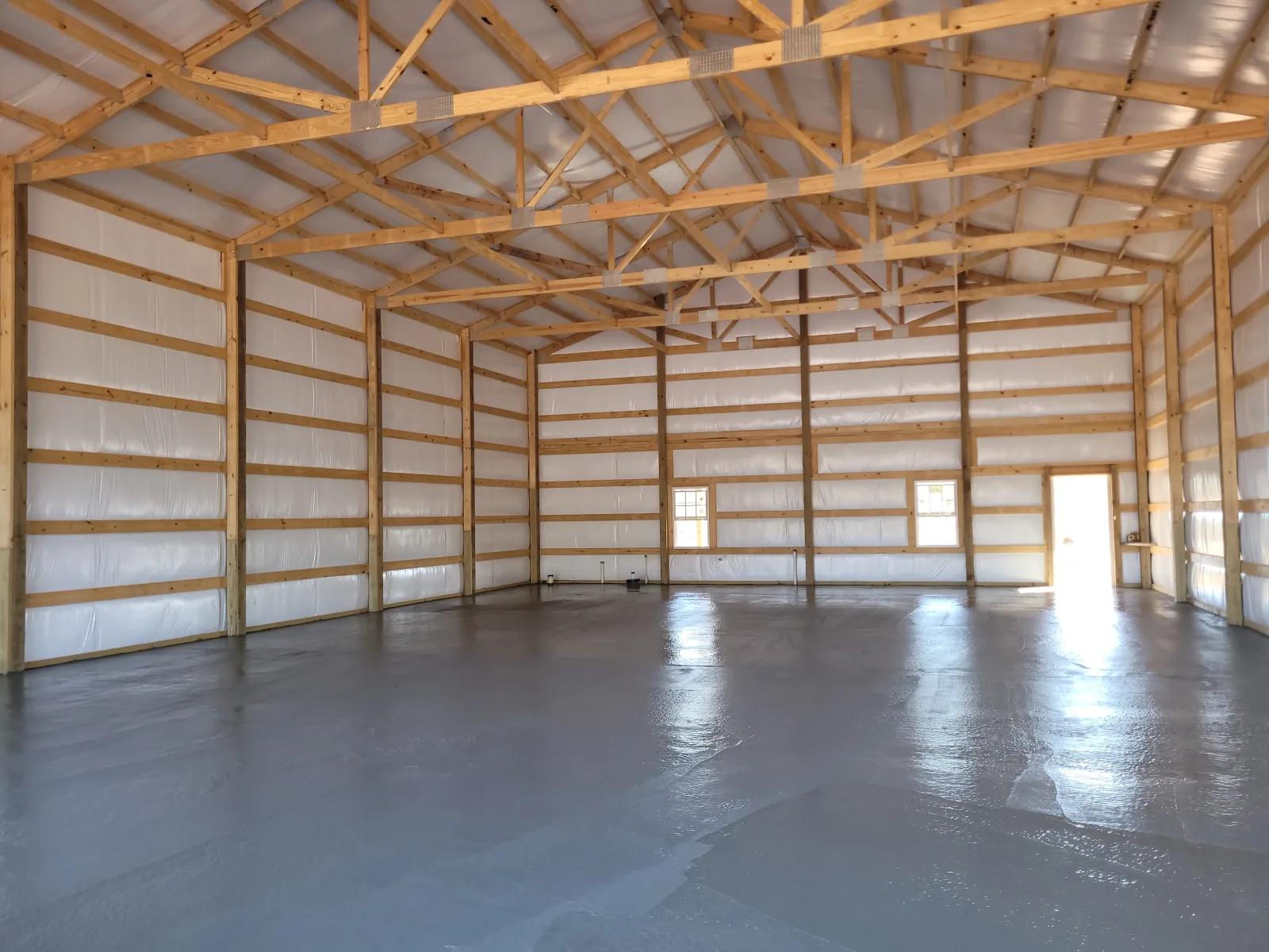 Equestrian barn with lean-to overhangs in Spartanburg County, SC